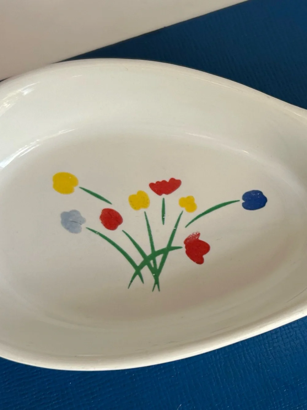 White Ceramic Spoon Rest with Colorful Floral Motif